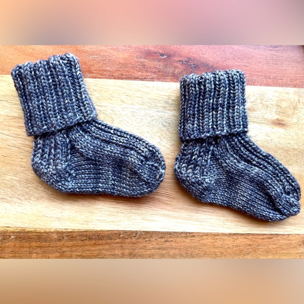 SOLD! Hand knit Baby Socks—that will actually stay on your baby’s feet!